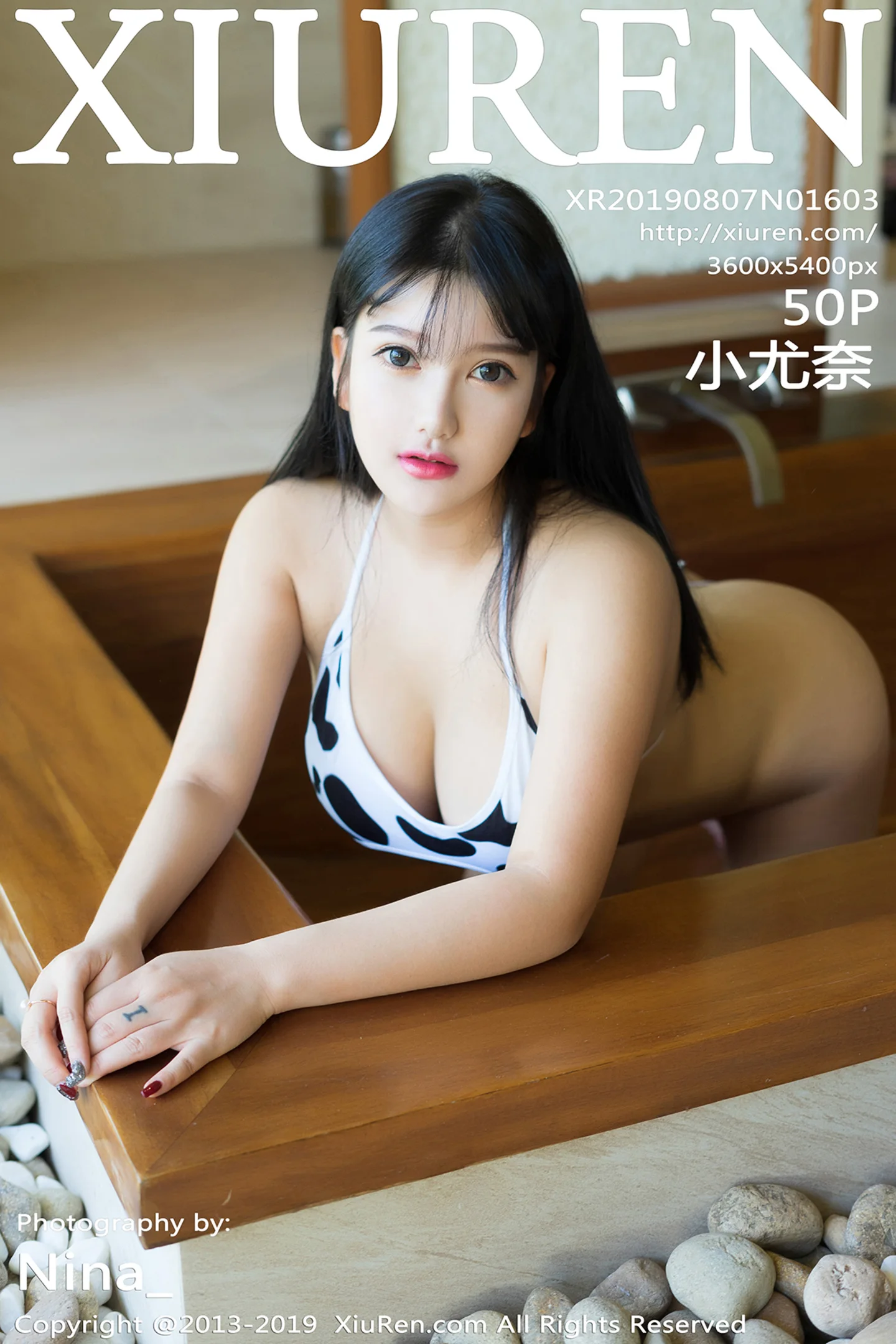 [XiuRen秀人网]No.1603_嫩模小尤奈富国岛旅拍私房奶牛内衣半脱露傲人豪乳极致诱惑写真50P-秀人网 - XiuRen.Space